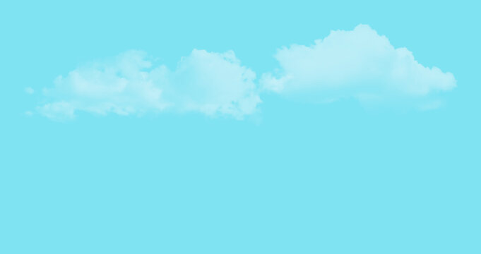 Soft white clouds floating in a clear bright blue summer sky background.