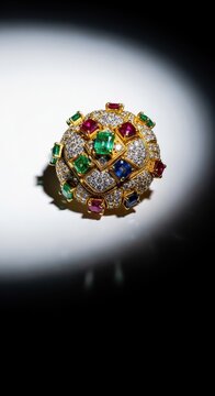 The pinnacle of luxury jewelry design, showcasing intricate gold work and brilliant, perfectly cut gemstones under bright studio light, superior, polished, valuable