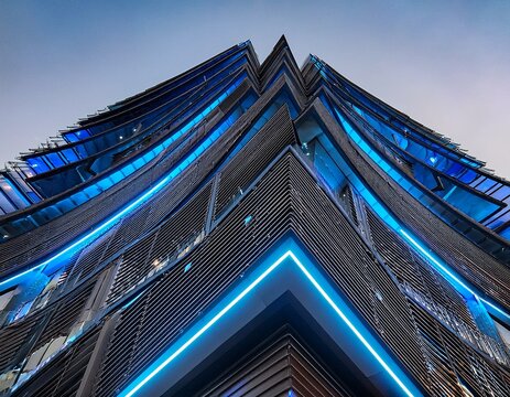 closeup view of a futuristic alien building with sharp angles and blue light accents