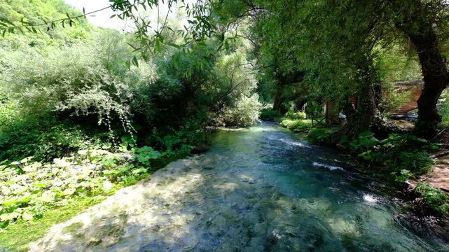 blue eye, syri i kater, Albania. Emerald green spring, close to Gjirokaster or Saranda. High quality FullHD footage