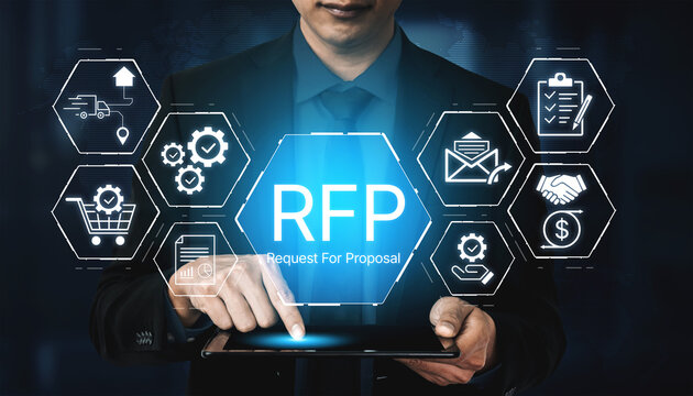 Businessman holding tablet with Request for Proposal concept in tech interface with icons for planning, agreement, tools, communication and transactions in a modern office setting. Bitwise.