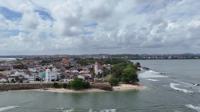 Galle, Sri Lanka, November 3, 2025: Aerial drone view of Galle city featuring the historic Galle Fort, lighthouse, coastline, and turquoise waters of the Indian Ocean.