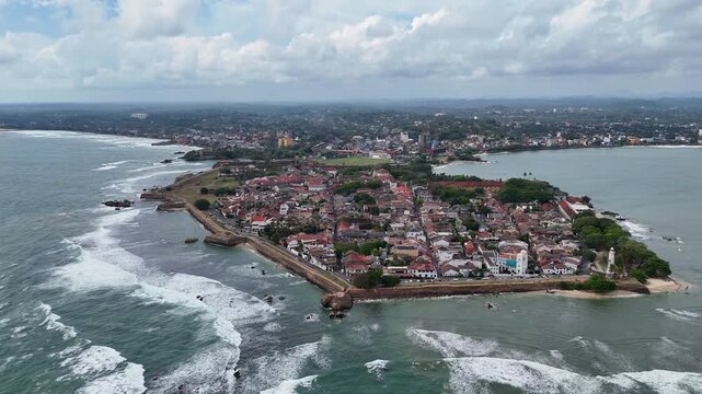 Galle, Sri Lanka, November 3, 2025: Aerial drone view of Galle city featuring the historic Galle Fort, lighthouse, coastline, and turquoise waters of the Indian Ocean.