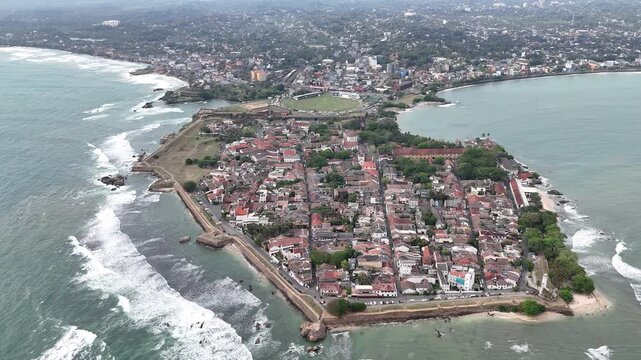 Galle, Sri Lanka, November 3, 2025: Aerial drone view of Galle city featuring the historic Galle Fort, lighthouse, coastline, and turquoise waters of the Indian Ocean.