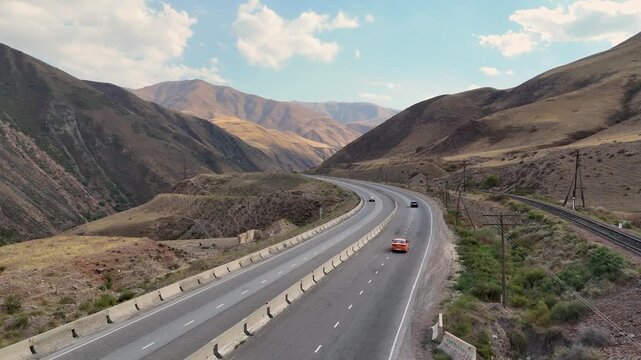 Issyk-Kul, Kyrgyzstan October,17,2025: A beautiful highway running beside Issyk-Kul Lake