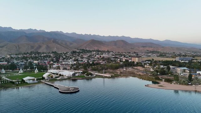 Cholpon Ata, Kyrgyzstan &ndash; December 2, 2025: Clear blue Issyk Kul Lake with mountain views near this popular tourist destination.