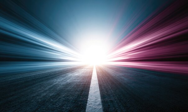 Fast road with bright light in distance, streaking colors