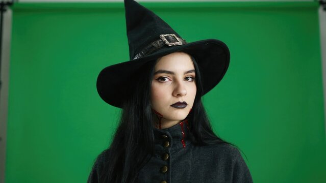 Young woman in witch costume for halloween