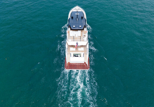 Aerial motorboat. Yacht boat tour. Luxury boat yachting. Motorboat sailing at sea. Luxury charter yacht in sea. Motor yacht luxury vessel. Sea motor boat. Sea summer vacation. Yacht lifestyle