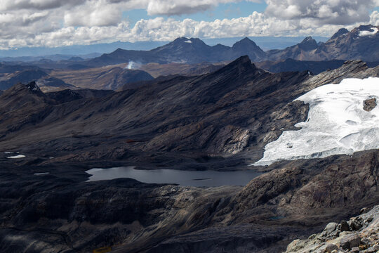 High Altitude Glacial Lake and Mountain Range in the Andes