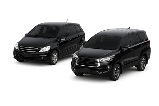 Two black MPVs isolated on white