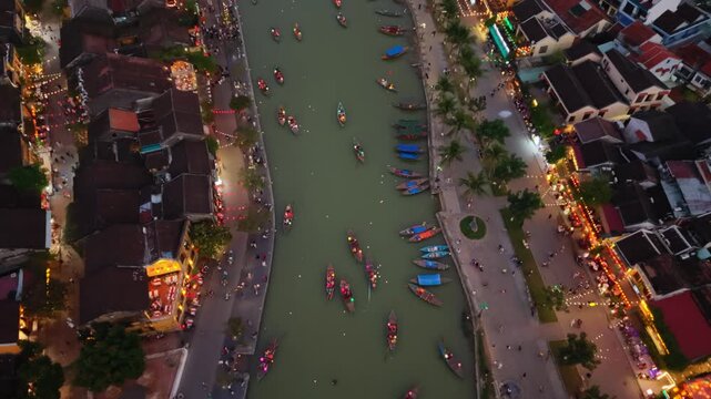 Illuminated Boats During Evening Parade. Brightly Lit Ships Drift Along River In Joyful Procession. Evening River Parade Features Glowing Boats And Cheerful Celebration Atmosphere