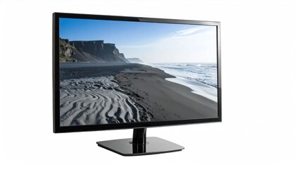 Fototapeta premium A glossy, rectangular screen displaying a beach scene with black sand and a clear sky, standing on a white background
