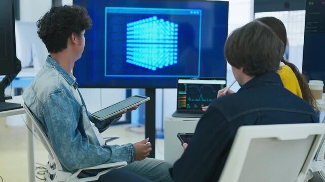 Businessman listening to speaker presentation on screen for corporate training marketing campaign tech startup creative collaboration strategy hybrid workspace office background	