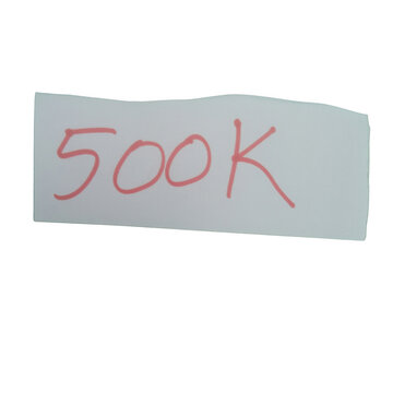 Handwritten 500k sign on a small piece of white paper isolated on transparent background