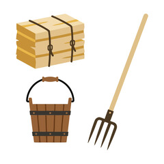 Set of farm tools including a hay bale a wooden bucket and a metal pitchfork for agriculture Vector © azad