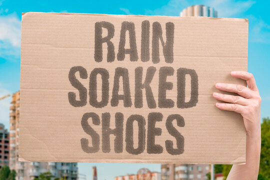 "Rain Soaked Shoes" Water completely penetrated the footwear. SHOES. SOAKED. THROUGH. RAIN. FABRIC.