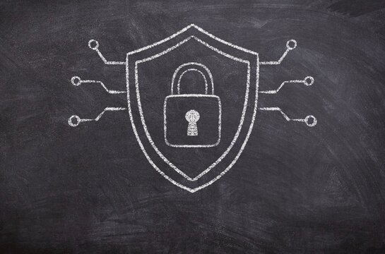 Padlock Inside a Shield with Electrical Cables Extending Away, Hand-Drawn Chalk Illustration on Blackboard, Minimal Digital Chalkboard Sketch, Cyber Security and Data Protection Concept Visualization