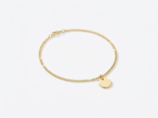 Fototapeta premium Delicate Gold Anklet with Disc Charm on White Background