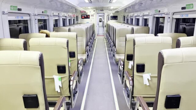Seats in an economy class train cabin. Transportation. Travel.