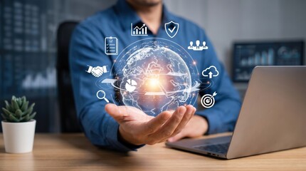 Fototapeta premium Businessman holding holographic globe with icons representing global connectivity, technology, security, and data analytics in modern office environment for corporate strategy c...