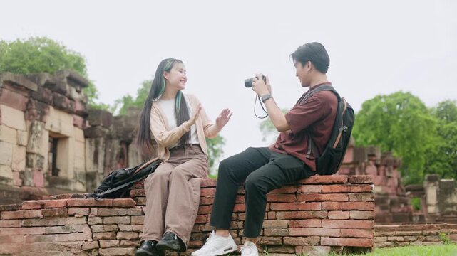 Travelers Checking Map on Tablet at Ruins Part 93