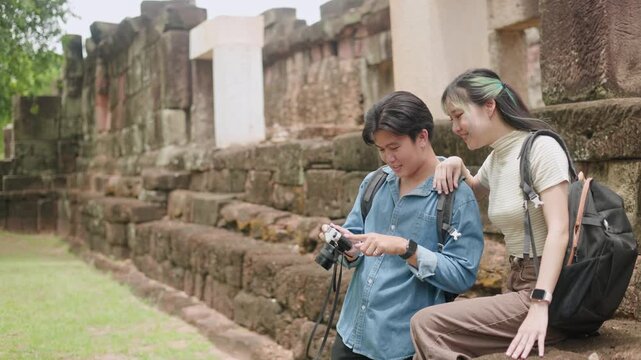 Travelers Checking Map on Tablet at Ruins Part 123