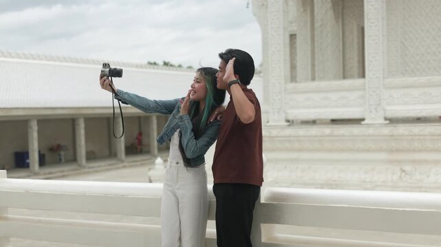 Tourists Holding Phone for Selfie at Ruins Part 149