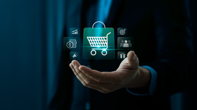 Ecommerce growth concept with business hand holding virtual shopping cart interface showing online sales marketing strategy customer target revenue and digital retail success