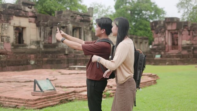 Travelers Checking Map on Tablet at Ruins Part 33