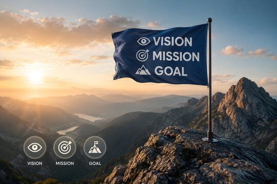 Corporate mission and vision statement flag planted on mountain peak at sunrise representing ultimate business goal achievement.