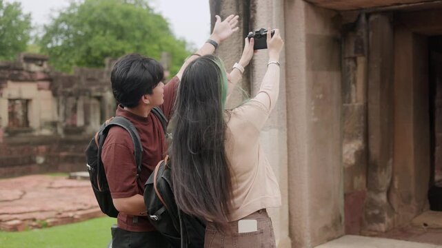 Travelers Checking Map on Tablet at Ruins Part 63