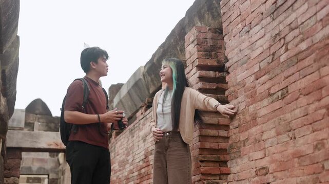 Young Backpackers Navigating Stone Castle Site Part 75