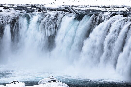 Godafoss waterfall, icy and snowy rock face, Northern Iceland Eyestra, Iceland