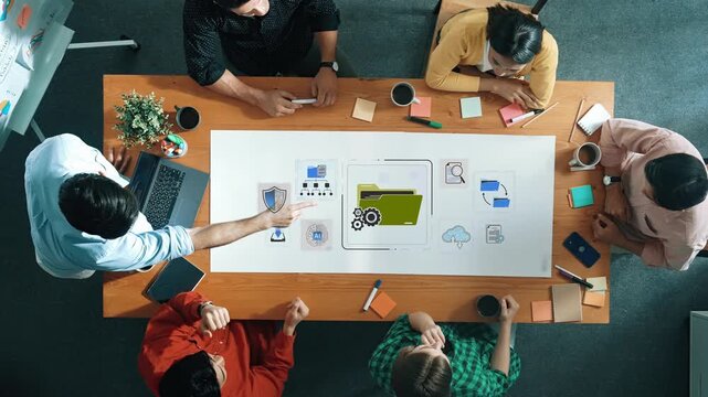 Diverse Team Collaborating in a Modern Office on Project with Digital Technology and Creative Ideas for Business Growth and Innovation Sigmoid