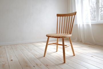 Fototapeta premium Simple wooden chair sits beside window. Light filters through sheer curtains gently. Floorboards reflect soft, natural illumination. Minimalist room invites quiet contemplation