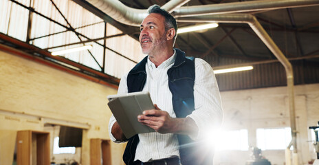 Fototapeta na wymiar Smile, inspection and man with tablet in carpentry warehouse for quality control. Manufacturing, timber factory and mature person with tech checklist for workshop, safety or compliance with flare