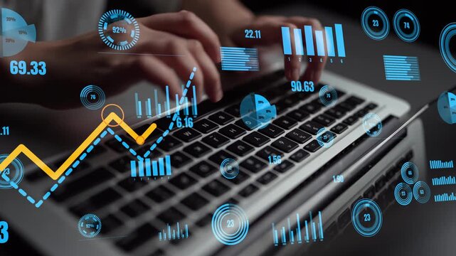 Close-up view of hands typing on a laptop keyboard surrounded by digital graphs and data overlays. Concept of data analysis and financial technology in modern business. Xenic