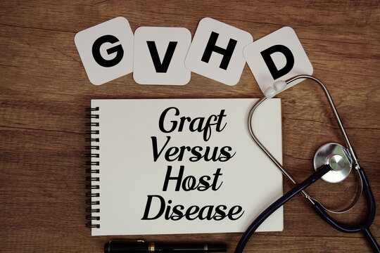 GVHD Graft-versus-host disease text written on notepad with stethoscope on wooden background