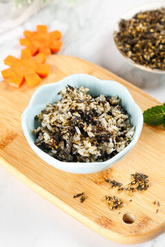 Sesame Seaweed Rice Crumbles Bowl - Healthy Asian Instant Snack Food on Bamboo Board
