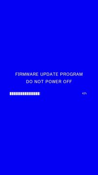 Vertical video of loading progress bar with on-screen text firmware update program do not power off on blue background