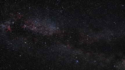 Fototapeta premium Dark deep space background filled with millions of tiny shining stars and subtle galaxy dust.