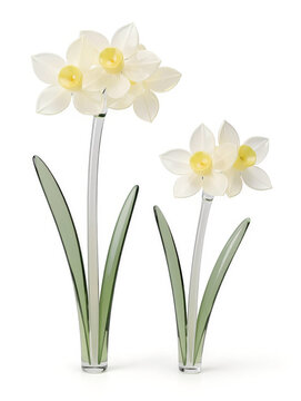 Glass art sculpture of white Japanese narcissus flowers, milky white blossoms with yellow cup centers and green glass leaves isolated on white background