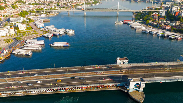 Istanbul, Turkey. Golden Horn Metro Bridge and Halic Station aerial drone view in morning sunlight. Aerial View