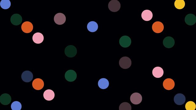 Colorful vibrant multi colored polka dot pattern animation with a dynamic fading effect video loop featuring flashing retro circles on black background. . Whimsical disco lights background glowing ret