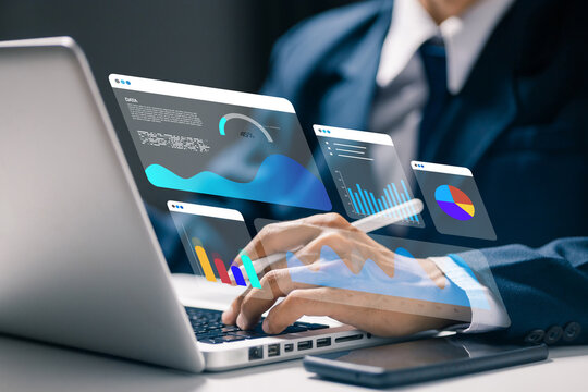 Business professional analyzing interactive data dashboard with charts and reports, illustrating business intelligence, analytics, financial performance, digital reporting.