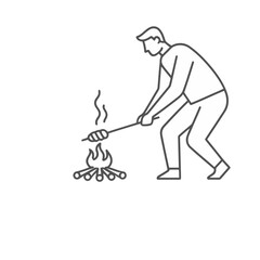 Fototapeta premium Man cooking sausage over campfire