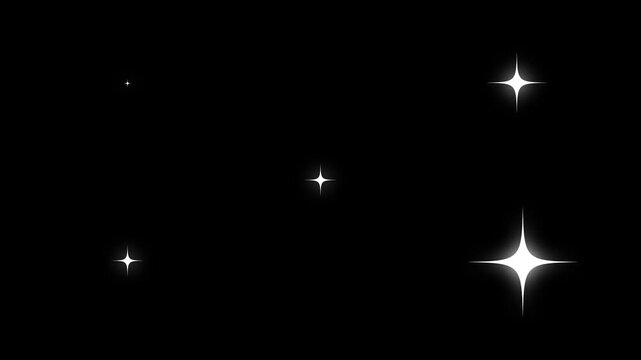 Shimmering white sparkles animate in a dark void with subtle cinematic motion and selective focus