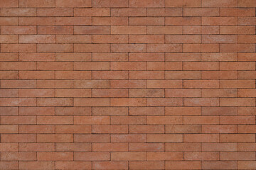 Fototapeta premium Realistic brick wall texture with natural color variation, detailed masonry surface, and authentic weathered appearance. Ideal for architectural backgrounds, seamless design, and material visualizatio