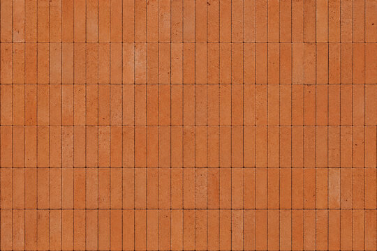 Realistic orange clay brick wall texture with clean vertical brick pattern, natural surface variations, and authentic masonry details. Ideal for architectural backgrounds and material visualization.